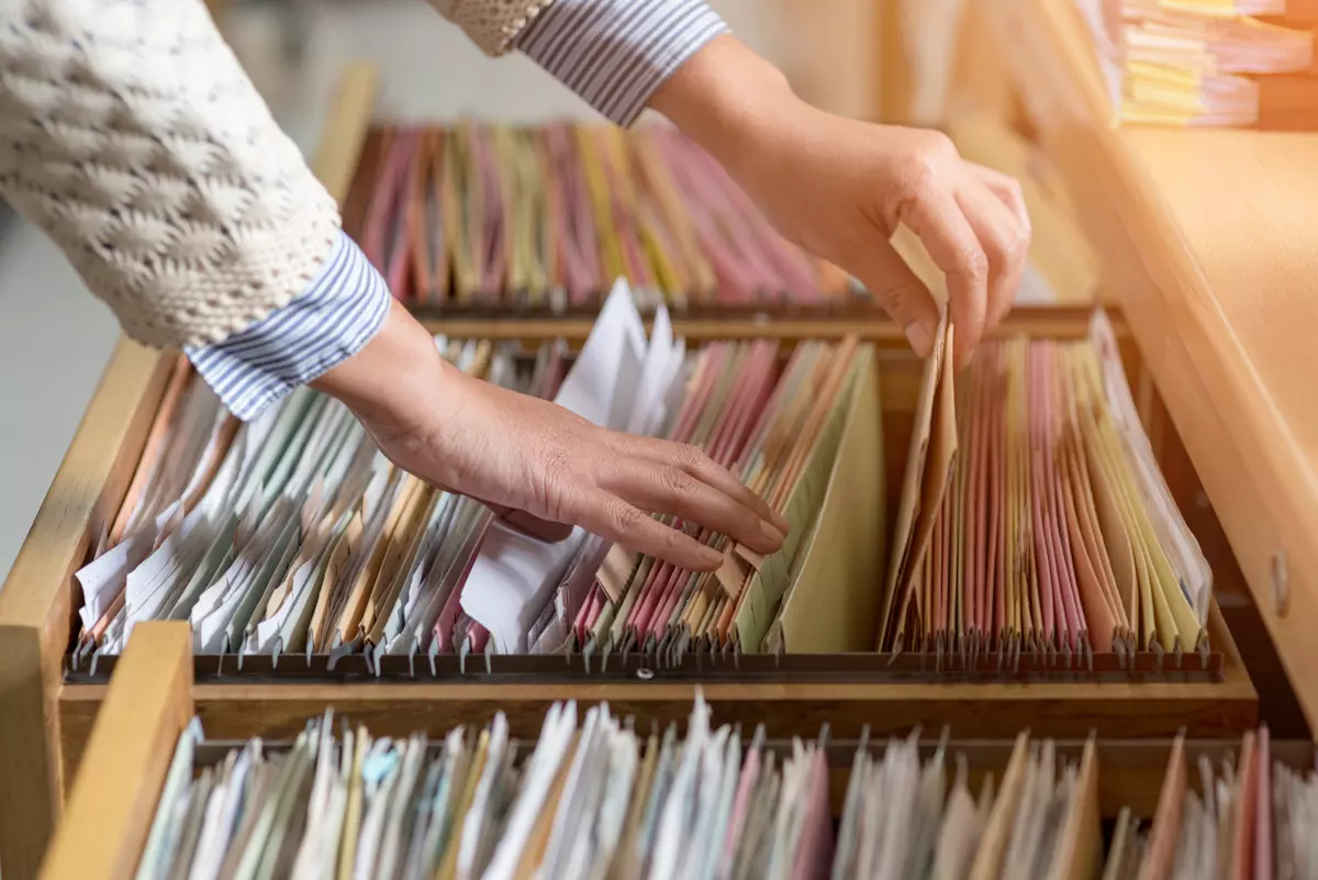 Woman checking financial documents