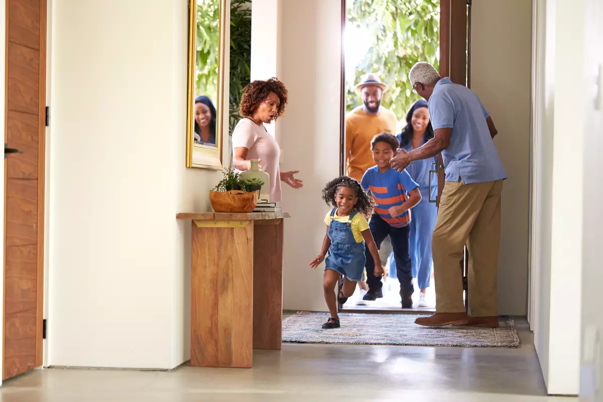 Family showing up at grandparent's house.