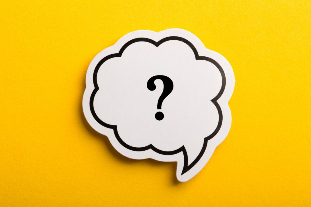 A question mark on a yellow background
