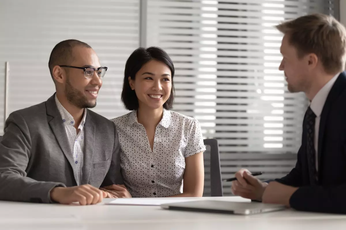 A financial advisor meeting with a clients.