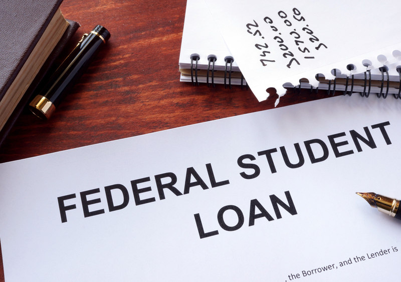 "Federal student loan" written on a paper.