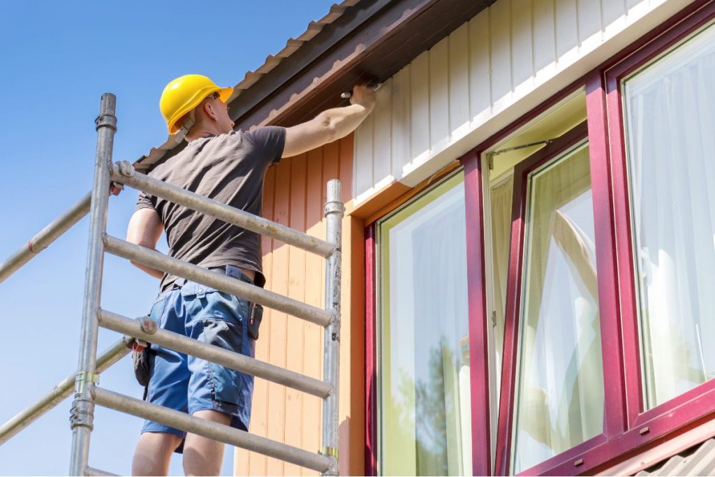 Professional painting exterior of house.