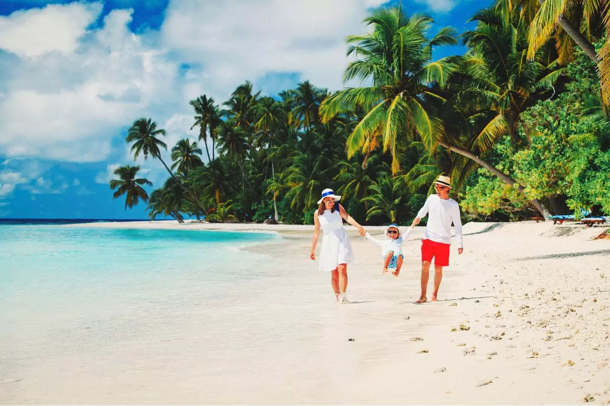 Family vacationing on the beach.