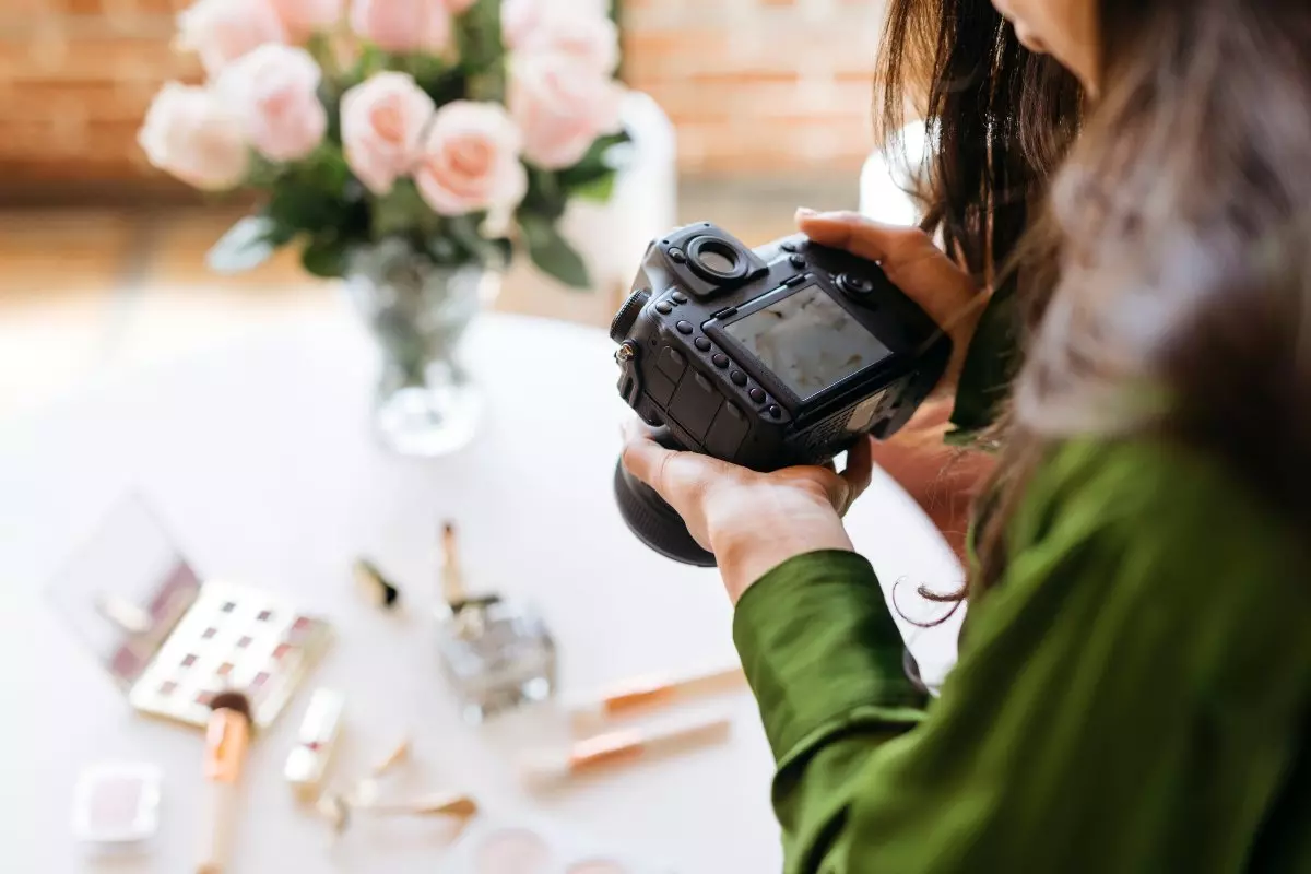 Photographer taking photos of makeup products