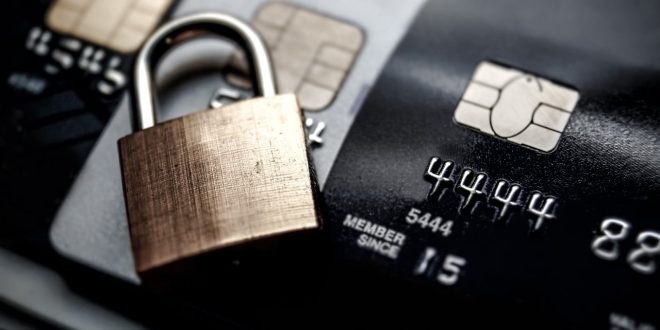 Close up on credit cards and a padlock