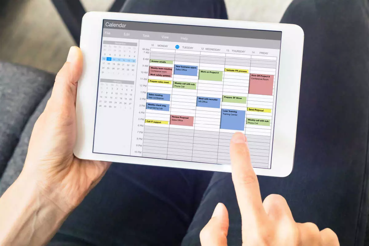 Manager reviewing calendar