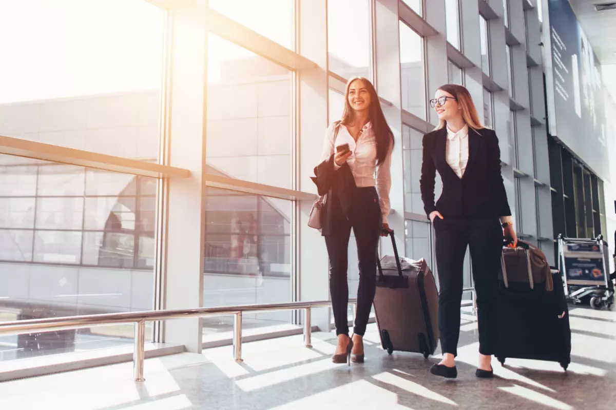 Two businesswomen traveling 