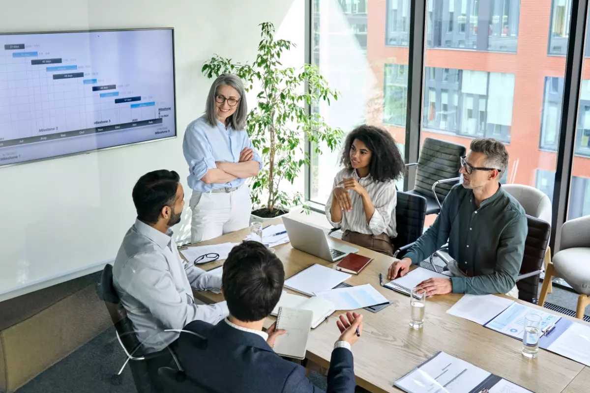 CEO presenting at a team meeting