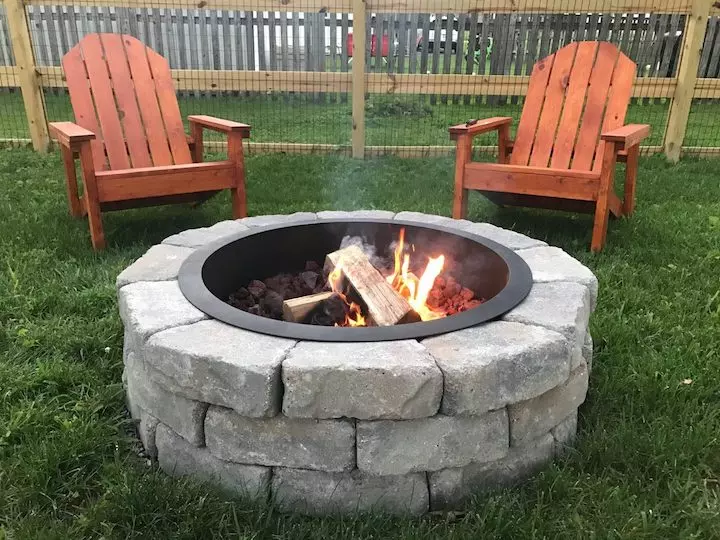 Block firepit with lawn chairs